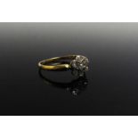 A gold Victorian diamond daisy ring, stamped 18. Size L, 1.