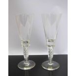 A pair of handcrafted oversized fluted glasses with spiral twist stem,
