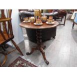 A Victorian mahogany wine table with barley twist columns,