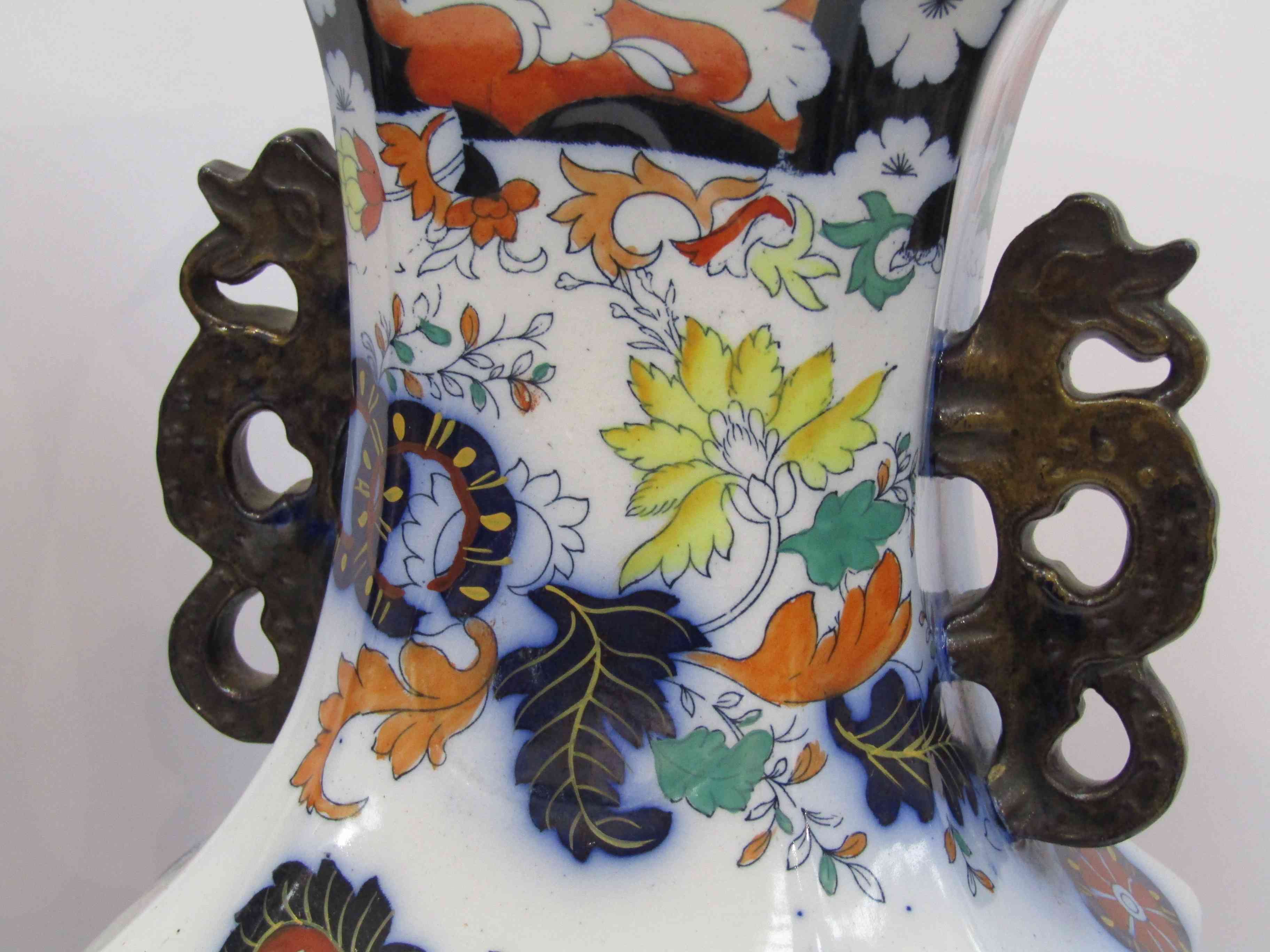 A pair of late 19th/early 20th Century Chinese style vases,