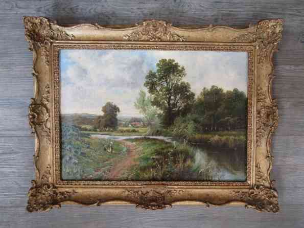 A late 19th Century oil painting 'View near Chester' depicting country scene with river figures,