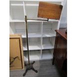 A 19th Century brass and mahogany music stand with cast iron base