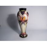 A Moorcroft Emma Bossons designed vase decorated with stylized anemones,