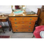 A 19th Century ash chest of four long drawers, parquetry inlaid stringing and diamond motifs,