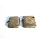 Two silver Vesta cases with all over engraved detail, both 5cm tall, one monogrammed,