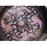 An Oriental mother-of-pearl inlaid bowl with dragon design,