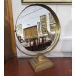 A circular table top milliner's shop swing mirror, circa 1930's,