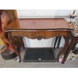 A 19th Century mahogany fold top tea table with cabriole legs, shaped top,