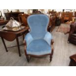 A Victorian spoon back chair with blue velour upholstery