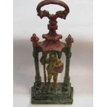 A 19th Century flat back figural door stop