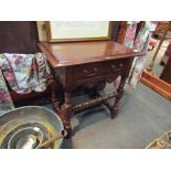 An early 18th Century style side table with single drawer and bobbin turned stretchers,