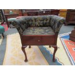 An Edwardian mahogany quarter veneered dressing table stool the single base drawer on pad foot