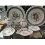 A pair of miniature vases, dishes and two china plates,