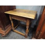 An oak side table/stool on stretcher base with drawer,