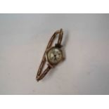 A lady's gold wristwatch