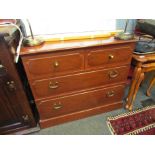 A modern mahogany two over two chest of drawers,