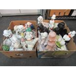 Two boxes of poodle figures