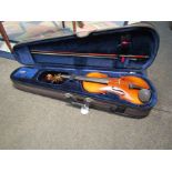 An early 20th Century violin, cased with bow,