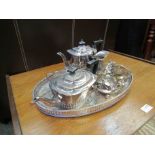 A silver plated teaset with tray and associated items
