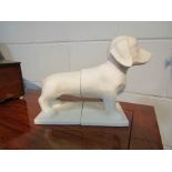 A pair of white ceramic Dachshund dog bookends