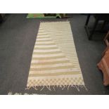 A green and beige stripe wool Kilim runner,