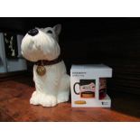 A ceramic biscuit barrel in the form of a Scottish Terrier dog together with a Danish cookie mug