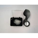 A 40x jeweller's loupe/pocket magnifier with LED light,