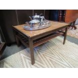 A 1970's teak two tier coffee table