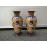 A pair of Royal Doulton stoneware vases,