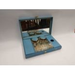 A retro lady's dressing table box with bottle and pot interior
