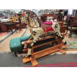 A painted dapple Lines early 20th Century rocking horse on trestle rocker,