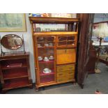 A Bedemeier style bird's eye maple cabinet,