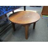 An oak circular occasional table, 42cm tall,