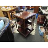 A 1920's mahogany revolving three-tier bookcase,