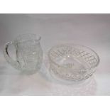 A cut glass water jug and fruit bowl