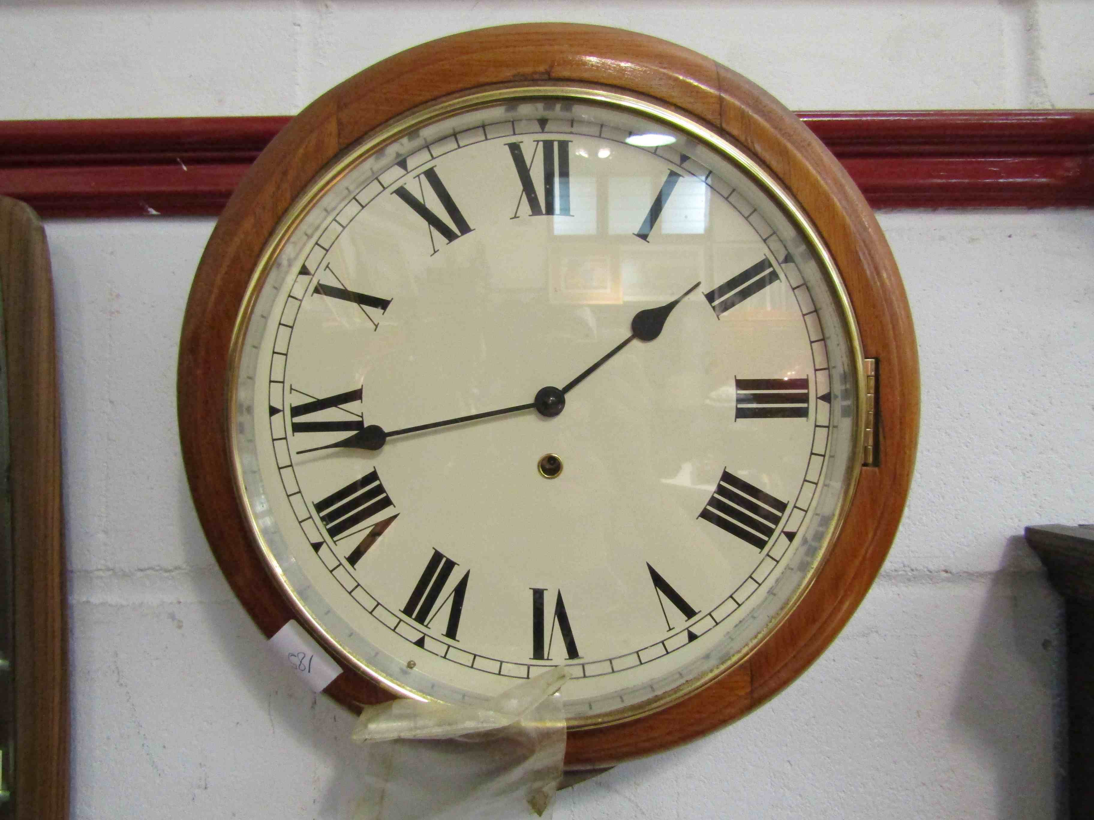 A wall clock with key,