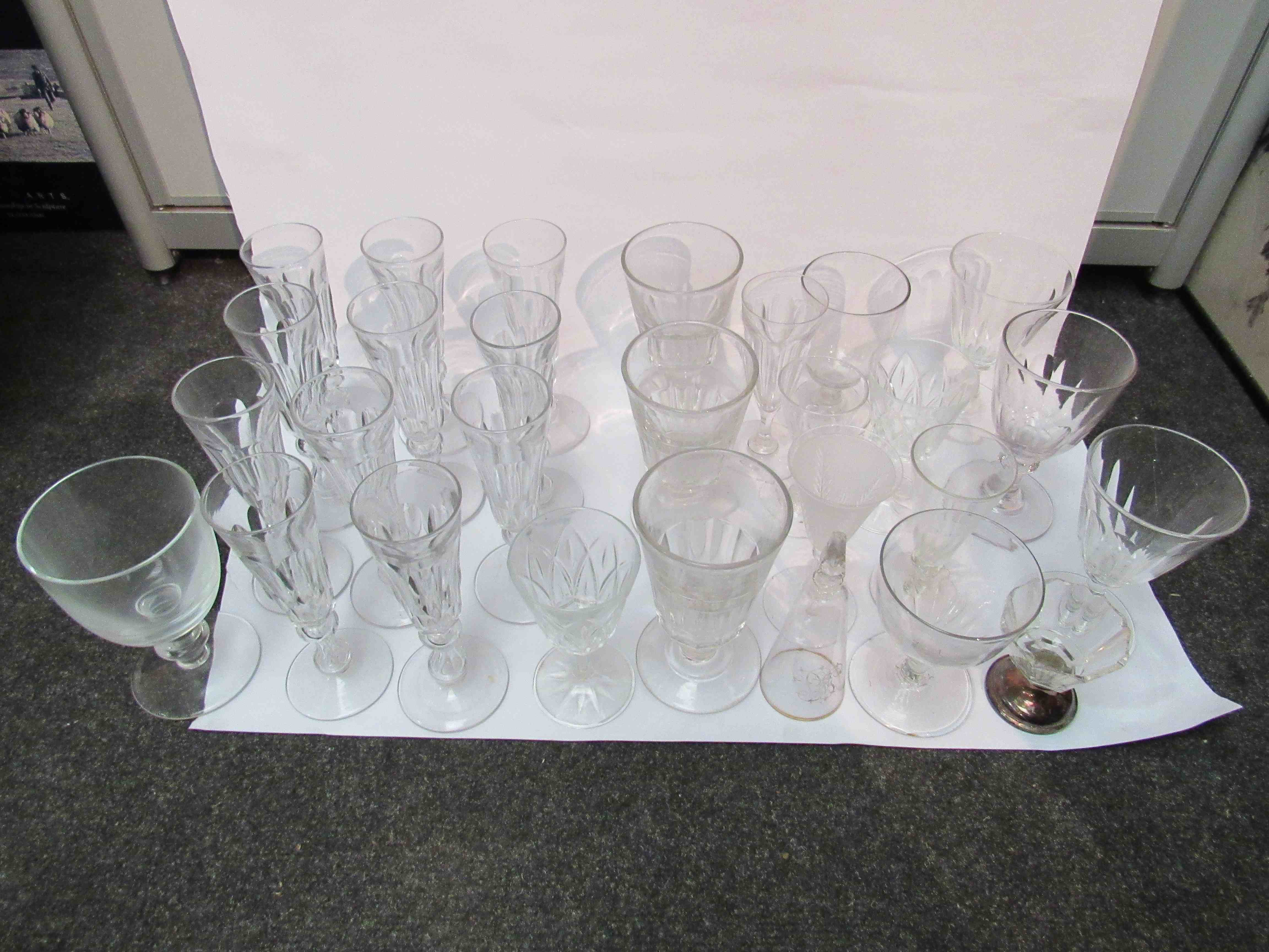 A box containing assorted metal and glassware