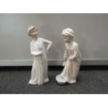 Two Neo figures girl & boy in night attire,