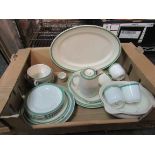A selection of Dunn Bernett white ground dinner wares with green and gilt rim