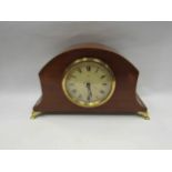 A British Edwardian mantel clock with Roman numeral dial