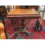 A mahogany tea table with fluted column, veneer missing,