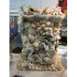 A Shell mounted grotto lamp,