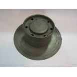 A tall large pewter capstan inkwell,