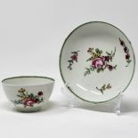 Polychrome teabowl & saucer, late rose pattern.