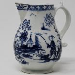 Blue & white 13cm jug with strainer lip and scroll handle with thumb rest,