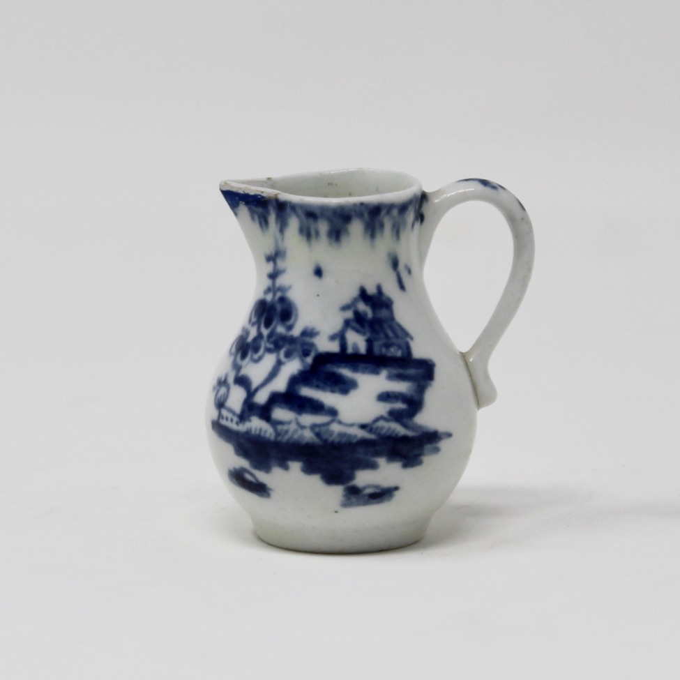 Miniature sparrowbeak jug 5cm, painted with island scenes.