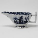 Fluted blue & white cream boat painted with houses and garden scenes, angular handle, 11cm..