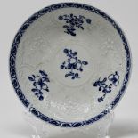 Relief moulded blue & white saucer,