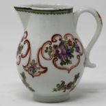 Polychrome sparrowbeak jug painted with flower sprays and iron-red scrolls.