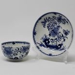 Blue & white teabowl & saucer painted with peony & root pattern